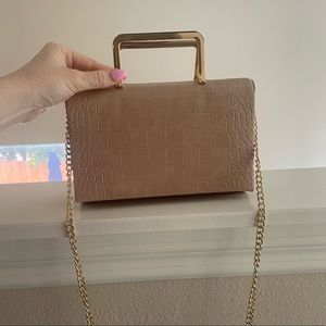 Small faux leather beige clutch. Used only once. Perfect for events